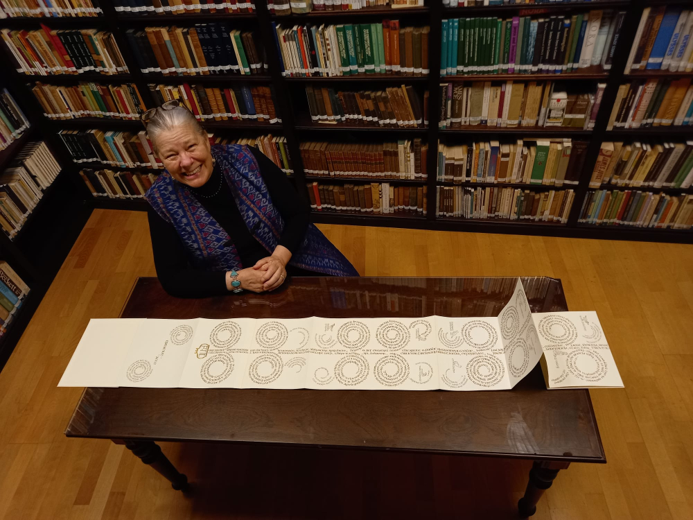 Susan Kelly vonMedicus with her art piece gifted to the Princess Grace Irish Library during the symposium in Monaco